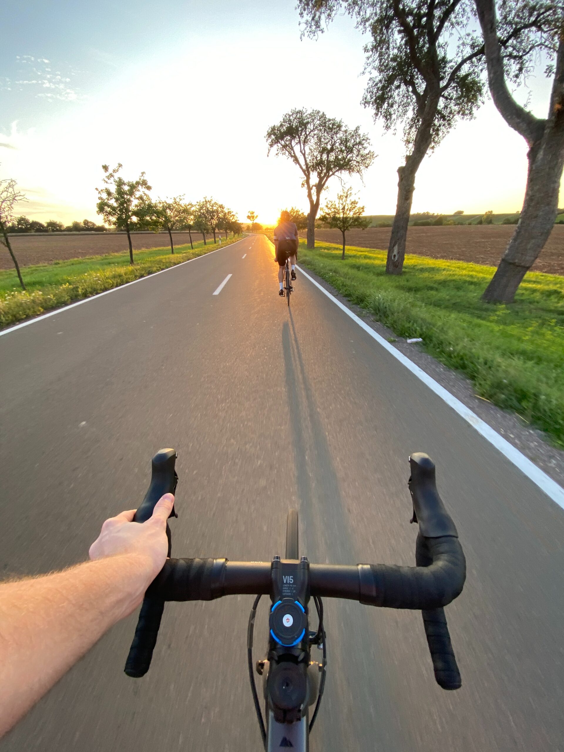 Cyclist pushing uphill