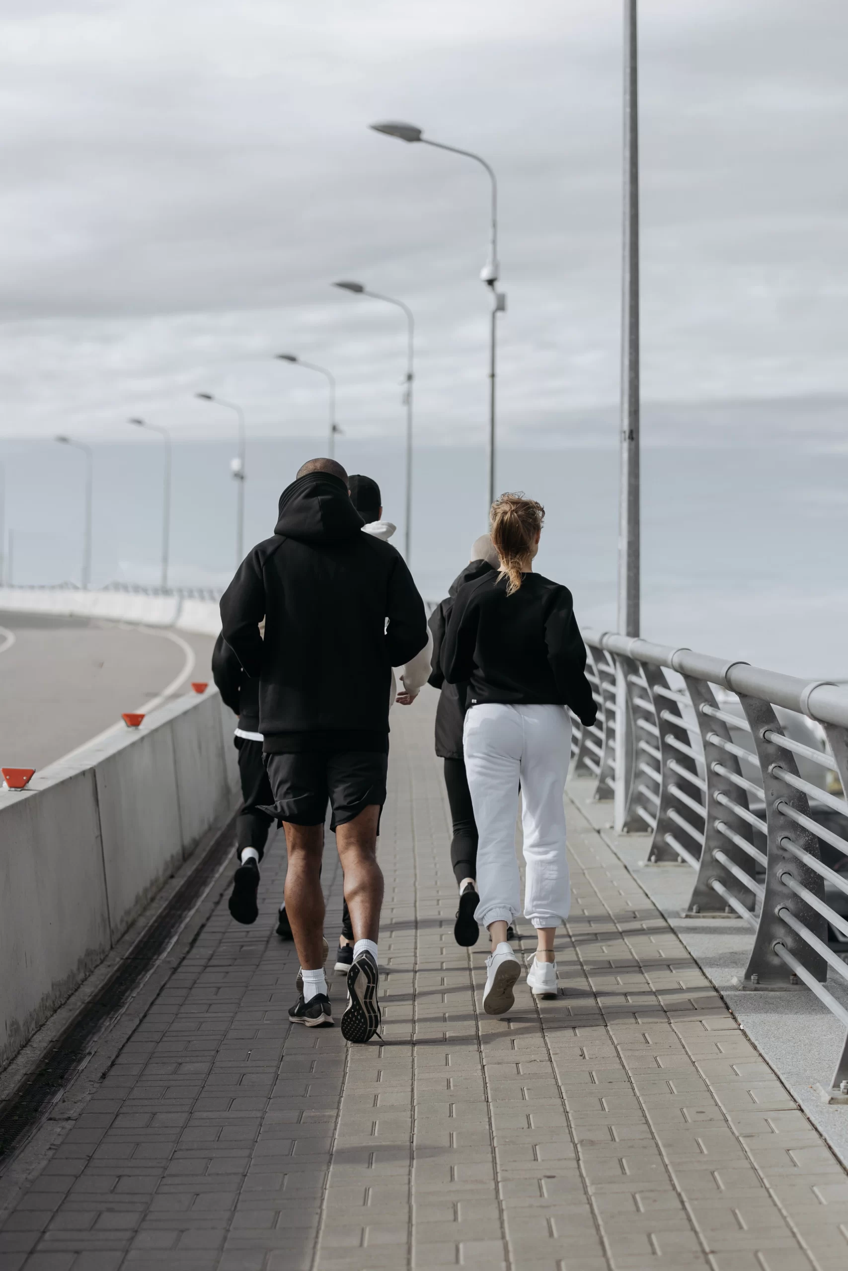 People jogging on pavement